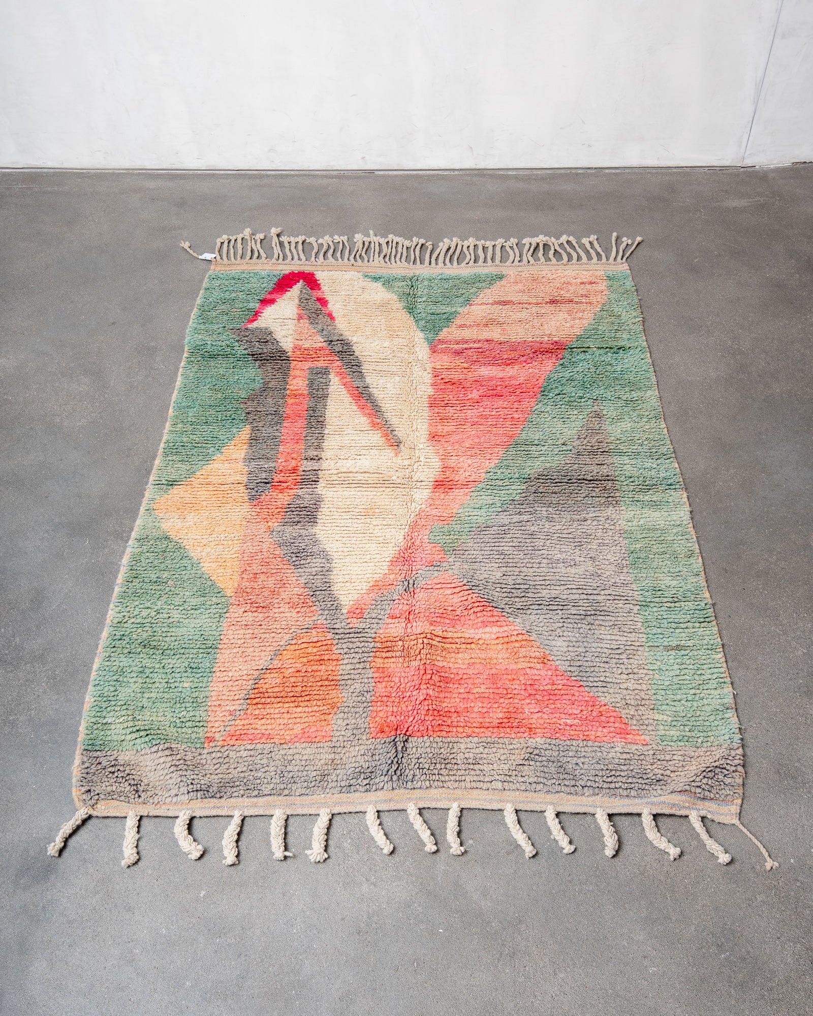 Modern designer handcrafted Berber rug from Morocco. Boujed with beautiful colors and patterns.